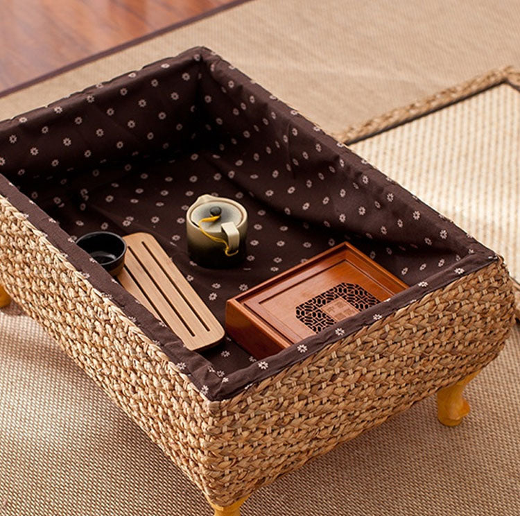 table basse rotin avec un coffre